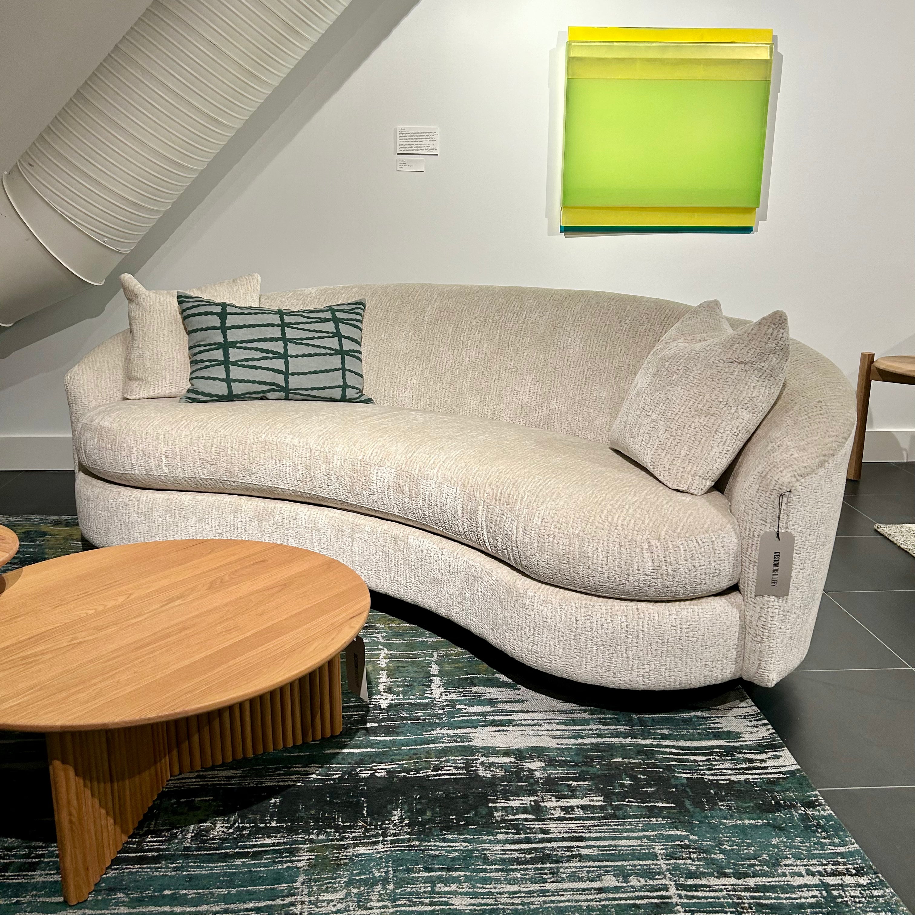Navie Curved Sofa - Floor Model