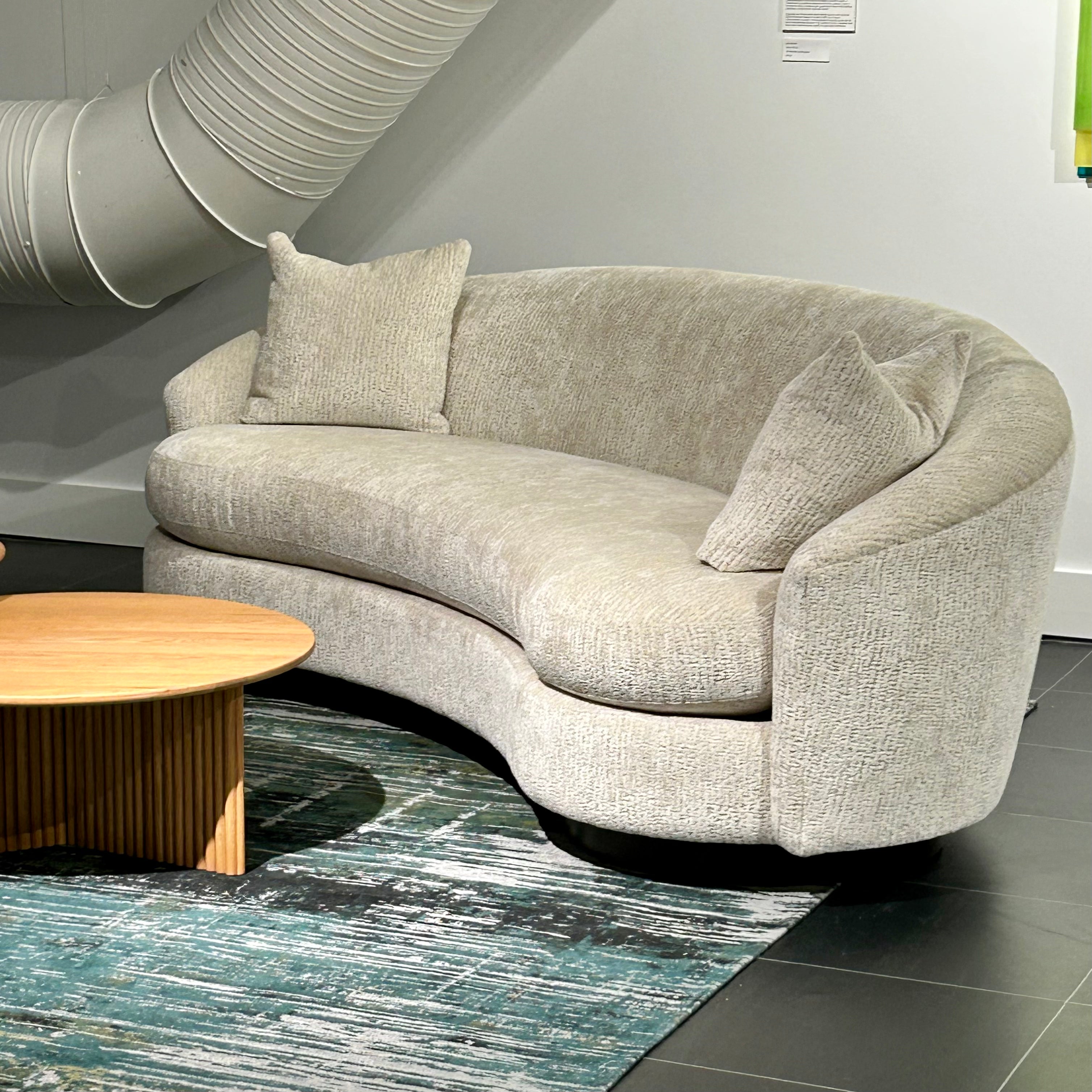 Navie Curved Sofa - Floor Model